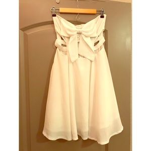 White Cut-Out Flowy Dress! From lookbook.co